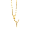 Close-up of golden letter Y pendant necklace featuring embedded white round pearls - Gold Letter Y