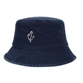 Detailed close-up of blue washed cotton bucket hat with white mushroom embroidery art - Adjustable / Navy Blue