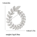 Spilla a ghirlanda di foglie d'argento con strass, misura 5.3x4.4cm e peso 13g - Argento
