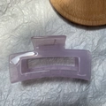 Macro detail of a large light purple rectangular jelly hair claw clip with metal spring - Jelly Purple