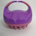 Purple scalp massager brush with soft pink silicone bristles and ergonomic handle - Purple + Pink Bristles