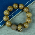 Argentinisches grünes Sandelholz Armband mit natürlicher Maserung und Münzschnitzerei - Laufring-Stil / 20mm x 12 Stk