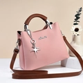 Pink and brown lychee grain leather handbag with stylish metal star pendant - Pink