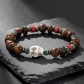 Macro shot of beads bracelet with sandalwood, coconut shell and skull charm on stone - ZJ12670-Wood and Stone Mixed White Skull Bracelet