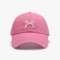 Pink baseball cap featuring white bow embroidery and adjustable ponytail opening - Rose Red