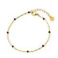 Bracelet chaîne en acier inoxydable doré avec perles cylindriques et accents noirs - Bracelet à Maillons de Perles Noires Doré (SAK950)