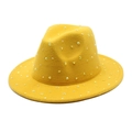Macro view of bright yellow fedora hat featuring sparkling rhinestone embellishments - Yellow
