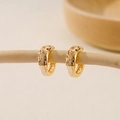 Gold plated hoop earrings featuring star cutouts and tiny cubic zirconia stones - EH411035