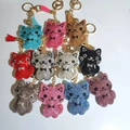 Sparkling rhinestone cat keychains in various colors with golden lobster clasps and tassels - Custom Colors