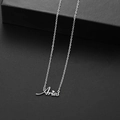 Elegant silver Aries zodiac necklace featuring a script pendant with heart dot detail - Aries Steel