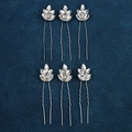Detail of six silver leaf rhinestone hair pins arranged neatly on a dark blue velvet surface - Marquise Rhinestone Leaf Style (FZ-001) / 6Pcs/Set / Silver
