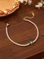 Macro view of gold tennis bracelet with green flower pendant and sparkling cubic zirconia - Green Flower Style (ZHB320-Green)