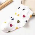 White crew socks with colorful heart patterns in red yellow and blue for a cute style - One Size / White