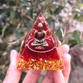 Handmade Orgone pyramid with golden Buddha statue and red crystal stone base - Style 17