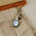 Vintage style women's quartz watch with silver metal chain strap and light blue dial - Silver Blue Dial