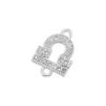 Macro detail of silver Libra zodiac charm with pavé zircon stones and double loops - Silver Libra