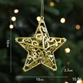 Golden cutout star ornament with ornate scroll design for Christmas tree decoration - Pentagram