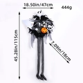 Halloween wreath featuring a Jack Skellington figure with black feathers and a pumpkin - Long Leg Pumpkin Skeleton