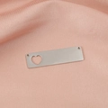 Close-up of a silver stainless steel rectangular pendant with a hollow heart and dual holes - Steel Color (MP340-4)