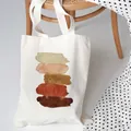 Minimalist canvas tote bag with artistic watercolor brush strokes on a wooden stool - C4-Beige Watercolor Brushstrokes / No Zipper No Inner Pocket