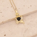 Macro shot of gold panda pendant with black heart gemstone and micro-pave crystals - Kung Fu Panda Black Heart Style (22#)