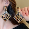 Macro shot of geometric resin leopard print earrings with elegant gold metal framing - 30# 925 Sterling Silver Earring Post - Gold Black - Square