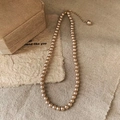 Elegant champagne pearl necklace with golden extender chain on natural linen fabric - 6MM Pearl + Gold Tail Chain / Champagne