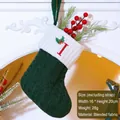 Dark green knitted Christmas stocking with white cuff and red embroidered letter I - Letter I / Dark Green