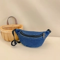 Kids' blue denim crescent waist bag with adjustable black strap in a rustic basket - Dark Blue