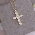 Macro shot of 18K gold plated cross pendant with cubic zirconia on a box chain - Transparent Oval and Round Stone Cross (8#)