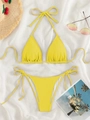 Detailed flat lay of a yellow textured bikini with halter top and side-tie bottoms - Beige