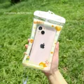 Waterproof phone case with cute bear and orange pattern in beige, 20.5x10cm size - Naughty Bear