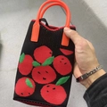 Handcrafted black knitted tote bag featuring red apple pattern and orange handle - Orange Black & Red