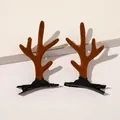 Detail view of brown plush reindeer antler hair clips on black metal alligator grips - Christmas Antler Hair Clips - Antler Coffee