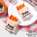 Miniature resin French bread stick accessory for DIY crafts and dollhouse decor - Baguette in Bag