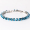 Bracelet tennis à une rangée de zircons ronds bleus 6mm sur monture argentée - Zircon Aigue-Marine Argent