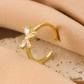 Adjustable gold butterfly ring featuring marquise-cut clear zirconia on a polished slim band - Gold Bow Tie Open Ring (DZ-715)