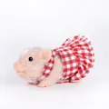 Realistic pink silicone piglet toy with white faux fur wearing red checkered dress - Pig with Plaid Skirt