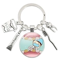 Silver dental keychain with floss, toothpaste, toothbrush and tooth shape charms - Chibi Dentist at Work