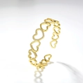 Dettaglio del bracciale aperto a cuore dorato con incastonatura di zirconi scintillanti - Oro Stile 2 (Cuore Cavo)