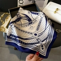 Blue and white silk square scarf with classic chain and unicorn print held by hand - 70*70cm / Blue