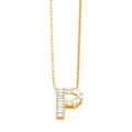 Macro detail of gold letter P pendant featuring rectangular cut crystals on box chain - Gold P