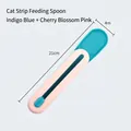 Cat strip feeding spoon in indigo and sakura pink colors with 21cm push design - Blue Spoon + Pink Lid