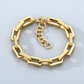 Detail of gold Cuban link chain bracelet with vertical stripes and lobster clasp closure - Gold (KB205979-ZCG)