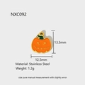 Macro view of orange enamel pumpkin pendant in stainless steel with 13.5mm size specs - NXC092-Classic Pumpkin