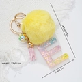 Porte-clés étoile pailletée résine lettre E avec pompon jaune et gland rose - Lettre E