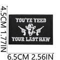 Detail of western cowboy patch with revolvers and hat embroidery measuring 4.5x6.5cm - No.11 (YOU'VE YEED YOUR LAST HAW)