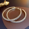 Elegante vergulde oorringen met glinsterende zirkonia-steentjes in micropavezetting - Wit 7cm Grote Creolen Stijl