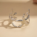 Detailed view of silver starfish open cuff bracelet with matte textured relief design - Hammered Starfish Biomimetic Style