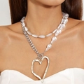 Detail of layered necklace with faux pearls and large silver irregular heart pendant - Silver (Layered Pearl Metal Chain Silver Heart)